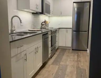 Bright, beautiful freshly renovated, 1 bedroom basement suite | Brockington Rd NW 5003, Calgary - Photo 1