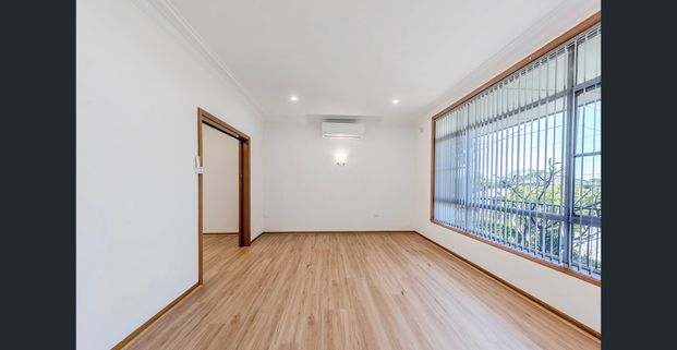 Elegant Character with Modern Enhancements - Photo 1