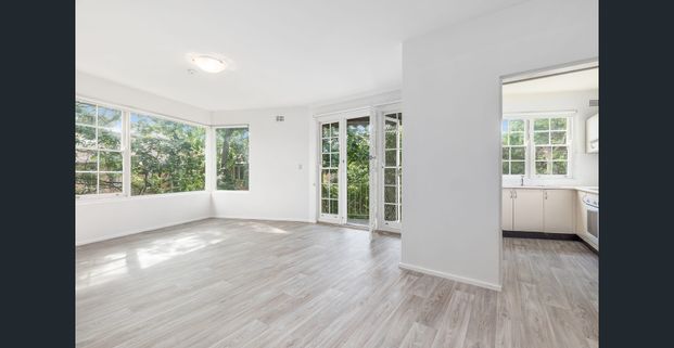 Light filled apartment amongst the trees - Photo 1
