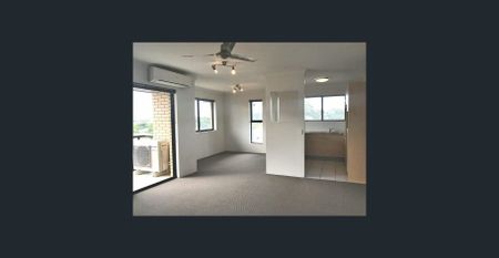 TOP FLOOR APARTMENT + LOCK UP GARAGE + CITY VIEWS - Photo 2