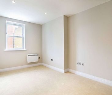 A luxury one bedroom apartment with off street parking. - Photo 1