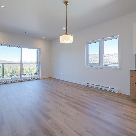 5 1/2 condo locatif neuf - Photo 1