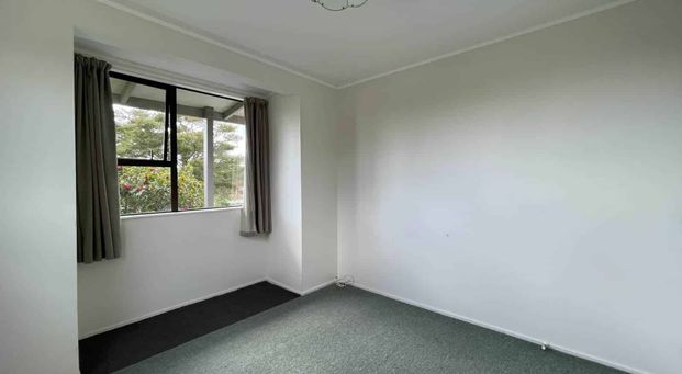 Sunny Two-Bedroom Home with Spacious Yard - Photo 1