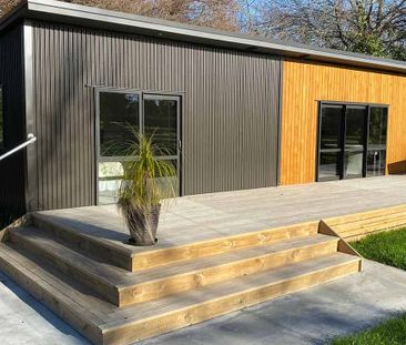 Charming 2BR Home with Modern Comforts - Photo 3