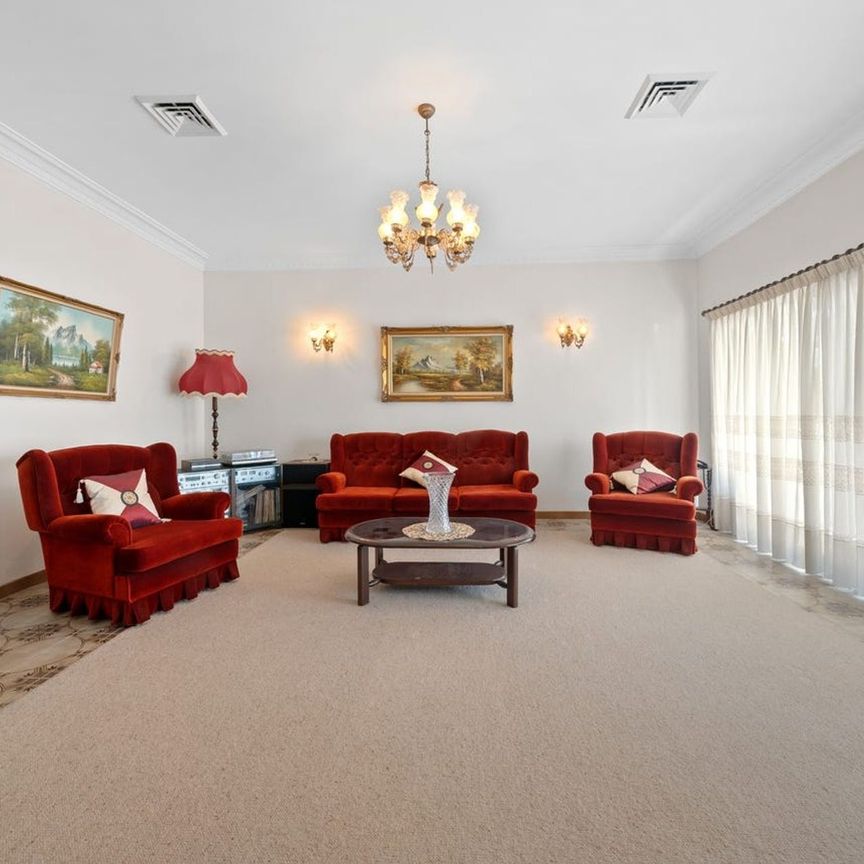 Spacious, Freshly Painted Family Home in a Prime Prairiewood Location - Photo 1