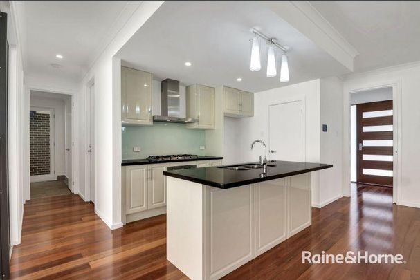 Near New 4 Bedroom Family Home in Premium Location - Photo 1