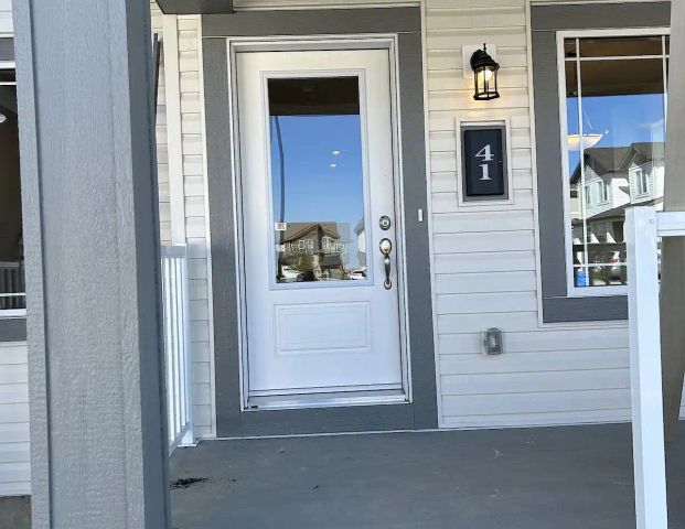 New End-Unit TownHouse in Carrington with double-garage- STILL AVAILABLE — 3 Bedrooms Townhouse - Photo 1