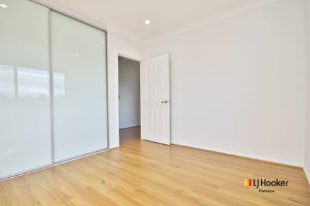 Spacious Family Home with Heated Spa & Double Garage - Photo 2