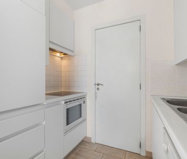 Ongemeubeld appartement met 1 slaapkamer en parking - Foto 2