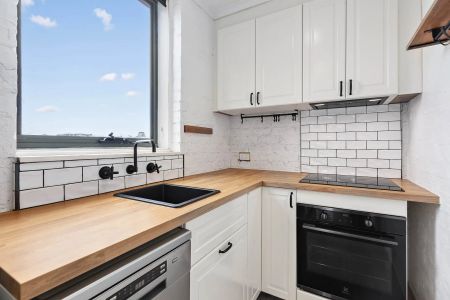 Light-Filled Top-Floor Sanctuary with Sweeping Views and Exceptional Space - Photo 4