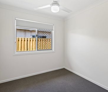 LOW MAINTENANCE AND MODERN 2 BEDROOM HOME WITH AIR CON AVAILABLE SOON! - Photo 1