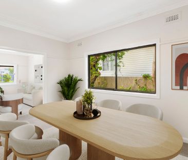 SPACIOUS FAMILY HOME IN A PRIME EAST CORRIMAL LOCATION - Photo 1