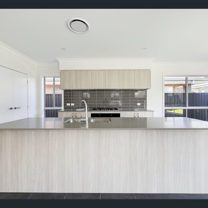 Brand New 4 Bedroom Home in Sought After Austral - Photo 1