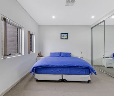 Exclusive Top-Floor Living in a Premier School Catchment - Photo 3