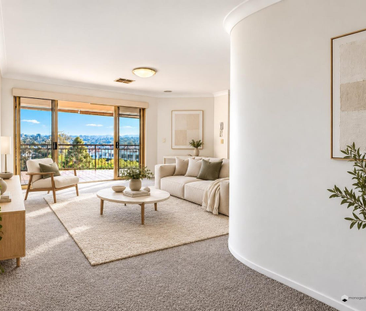 Spacious Three-Bedroom Apartment with City & Mountain Views - Photo 2