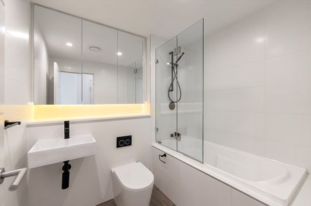 Split-Level I Courtyard Apartment I Lockup Garage - Photo 3