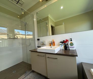 Spacious 4-Bedroom Home with Two Living Areas and Modern Upgrades - Photo 3