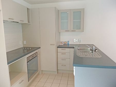 Townhouse Living in fully gated complex with 2 carparks - Photo 4