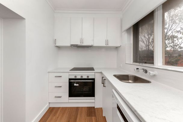 Step into this Beautifully Updated First-Floor Flat! - Photo 1