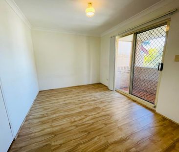 Split Level 2 Bedroom Townhouse With Open Car Space! - Photo 2