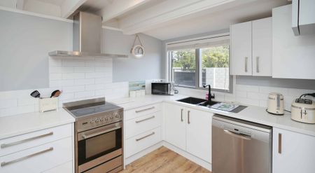 Modern Beachside Living - 3-Bedroom Home in Waikuku Beach - Photo 5