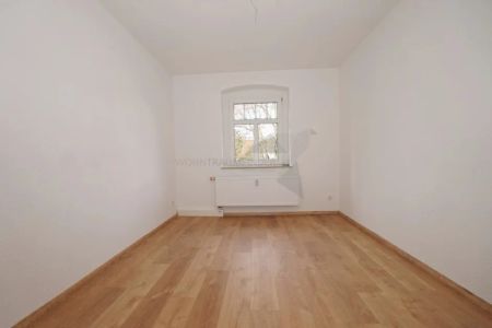 Sanierte 3-Raum-DG-Wohnung mit Garten - Foto 3