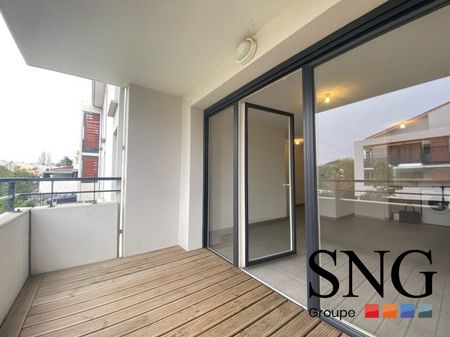 T2 AVEC BALCON ET PLACE DE PARKING - Photo 2