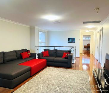 Spacious 6-Bedroom Family Home with Premium Features - Photo 1
