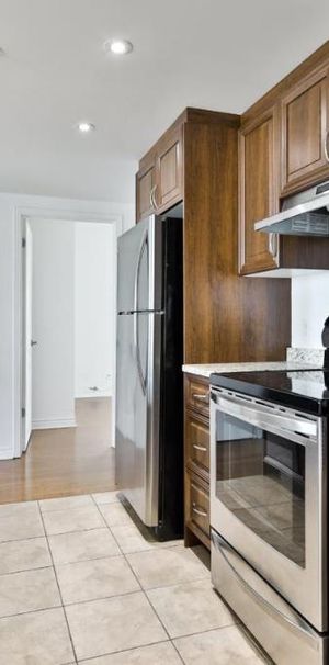 Lumineux 4 1/2 moderne tout inclus, vue imprenable sur le fleuve – Disponible immédiatement à Brossard - Photo 1
