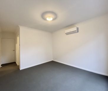 Perfectly Positioned Three Bedroom Townhouse - Photo 3