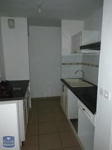 Location Appartement 2 pièces 43m² LA POSSESSION 97419 - Photo 4