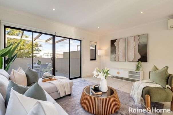 Modern Two-Storey Townhouse Offering Easy Living in a Convenient Location - Photo 1