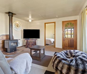 Cosy Brick Home with Comfortable Living - Photo 1