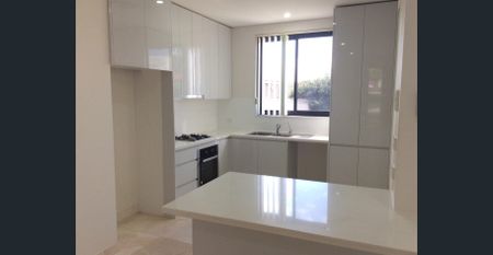 Modern 3 Bedroom Full Brick Duplex - Photo 5