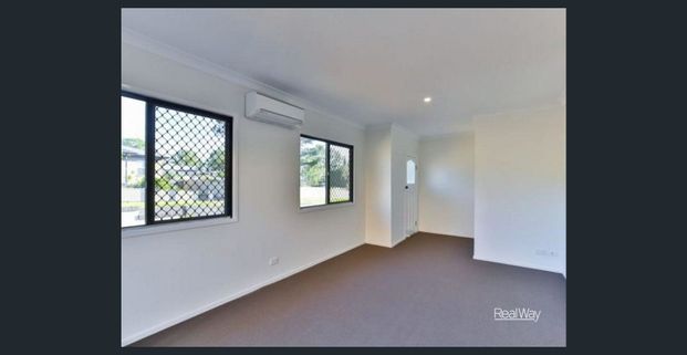 Stylish, Low-Maintenance Living Awaits - Photo 1