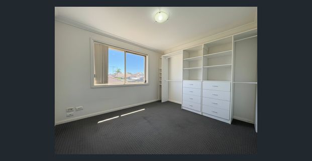 Modern Comfort Meets Low Maintenance Lifestyle - Photo 1