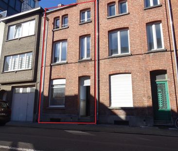 Gezellige en ruime rijwoning met 3 slaapkamers op toplocatie! - Photo 4