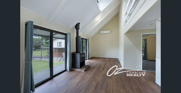 Charming 5 Bedroom Home - Photo 1