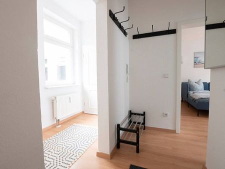 Zweiraumwohnung mit großer Terrasse im Zentrum - Foto 4