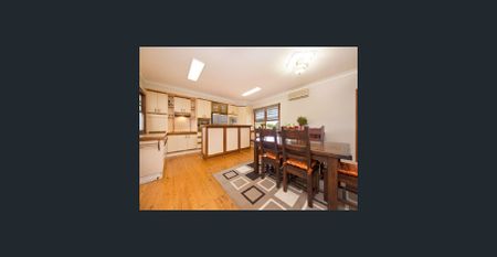 The Whole Package! Spacious 5-Bedroom Home + Sheds Galore! - Photo 3