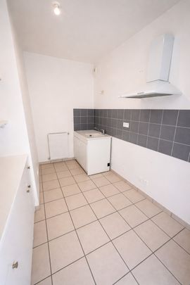 Location Appartement 4 pièces 79m² ROMANS SUR ISERE 26100 - Photo 1