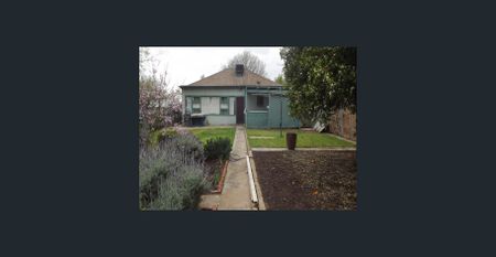 DELIGHTFUL TWO BEDROOM RESIDENCE WITH LARGE DOUBLE GARAGE AND PRIVATE LEAFY GARDEN. - Photo 5