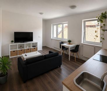 Pronájem bytu 1+kk 26 m2 - Fotografie 1