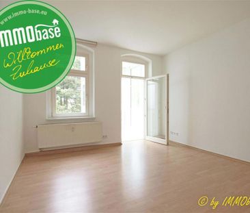 Wohnen mit Wintergarten und Einbauküche! - Foto 1