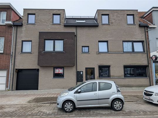 Gelijkvloers appartement met tuin en garage - Foto 1