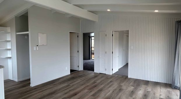 Stylish Renovation with Loads of Parking & West-Facing Deck ! - Photo 1