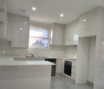 Fully Renovated Four Bedroom Family Home - Photo 4