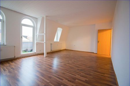 Zentrale Lage trifft auf charmantes Wohnambiente – Ihre neue Dachgeschosswohnung wartet! - Foto 2