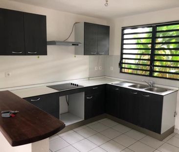 Location Maison 4 pièces 85m² REMIRE MONTJOLY 97354 - Photo 2