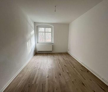 Helle Erdgeschosswohnung – mit Einbauküche und Pachtgarten auf Wunsch - Foto 1